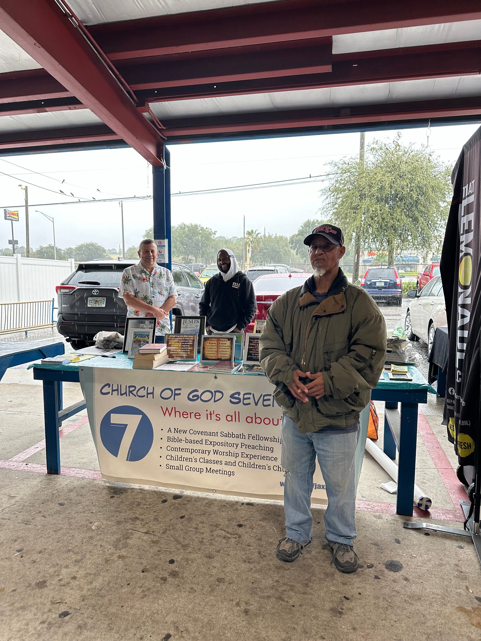 Jacksonville church members serving and praying at a flea market