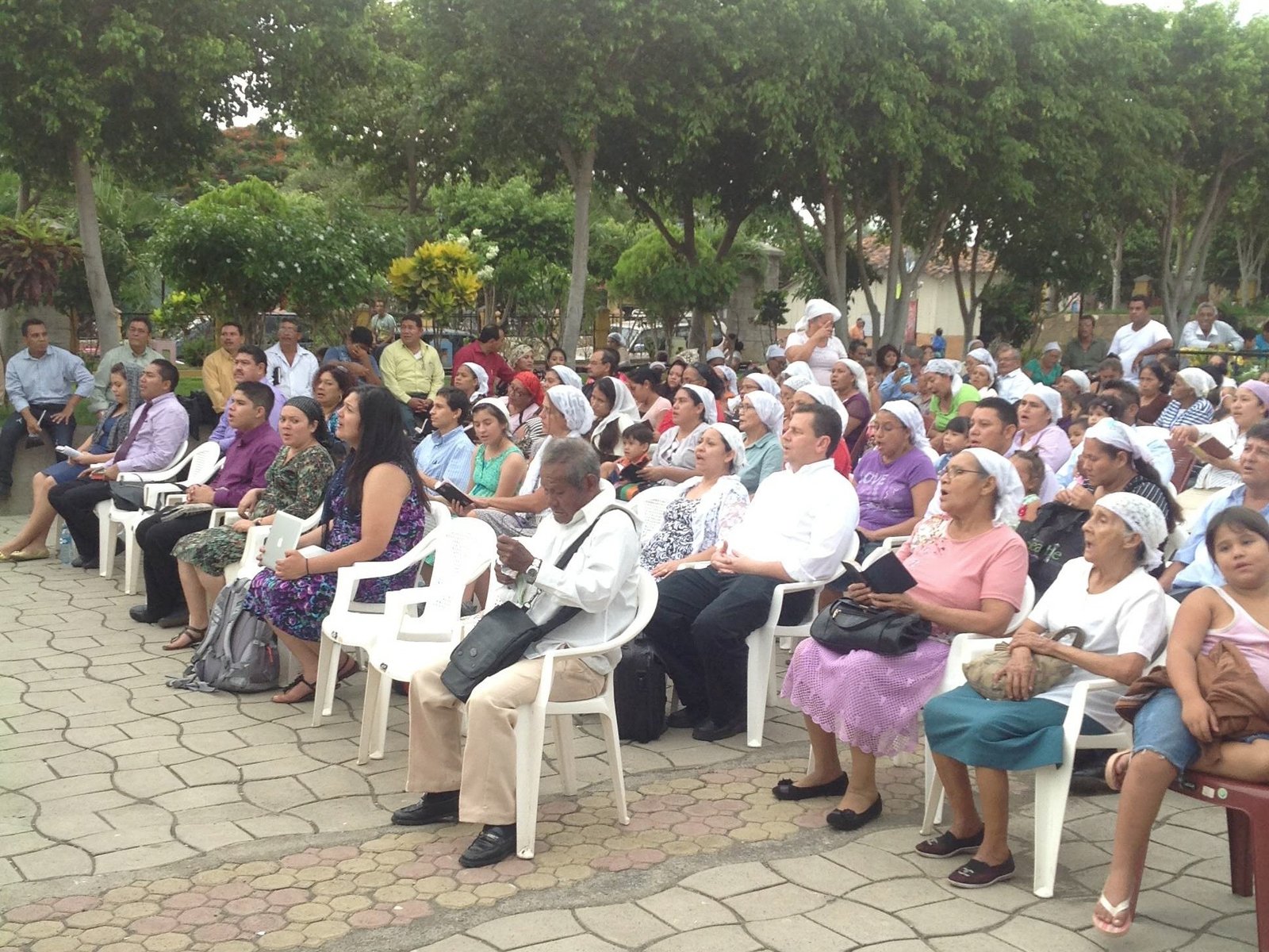 People gathered for an outdoor Christian service in Nicaragua
